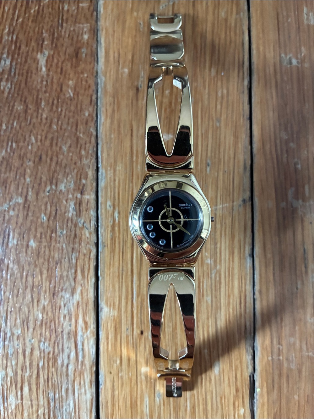 Swatch Gold and Black 007 James Bond For Your Eyes Only Bracelet Watch